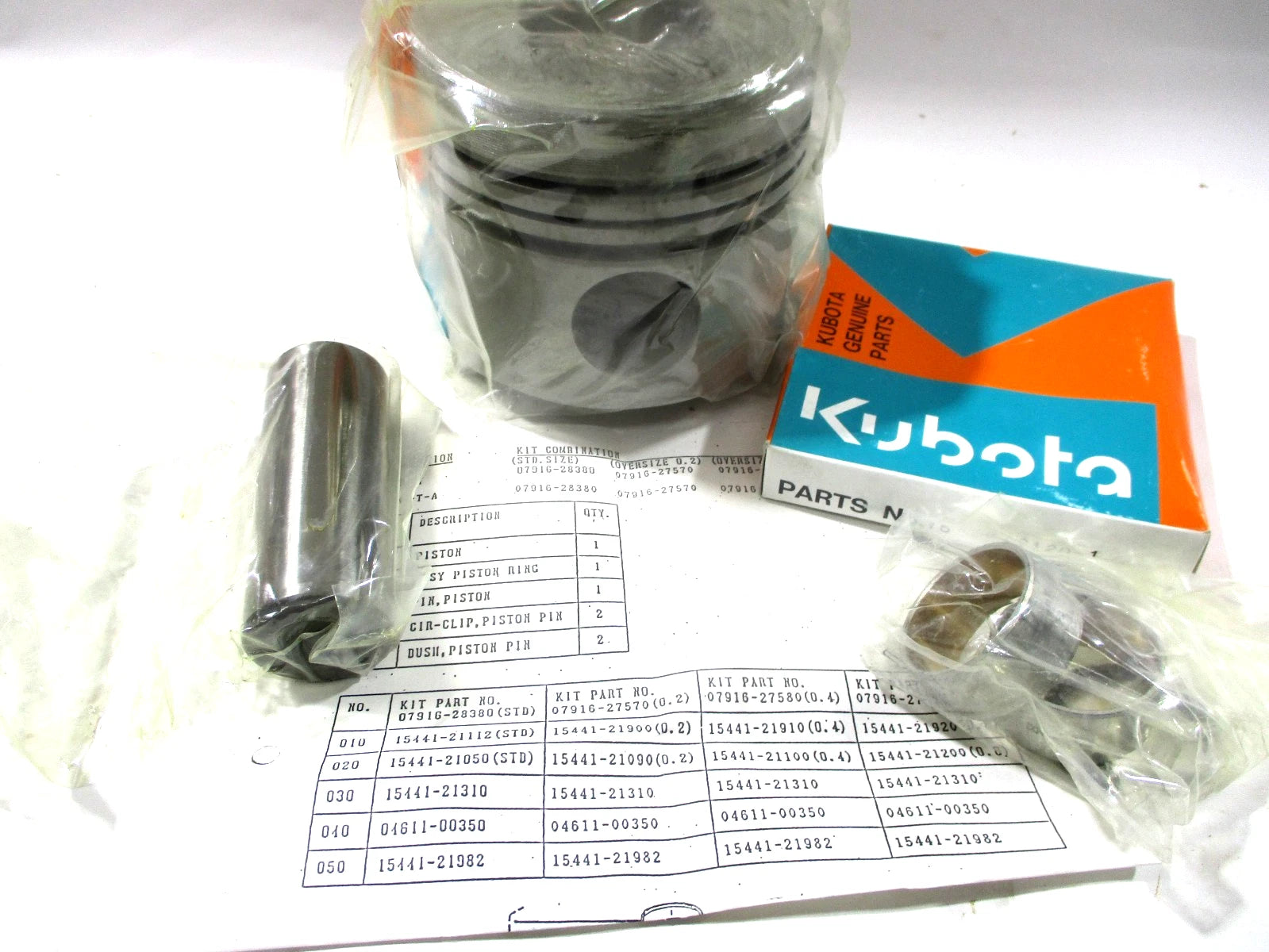 Kubota Piston Ring Set V4300 V4300T Diesel Engine OEM .6 Oversize